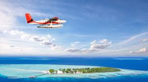 Seaplane over Maldives islands